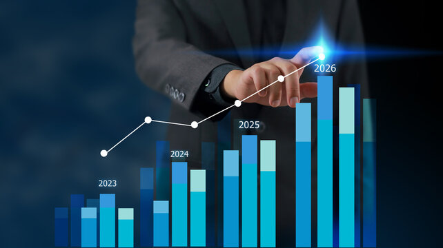 Businessman reviewing balance sheet and virtual data charts. financial analysis concept, strategy planning and growth opportunities, calculating company investment