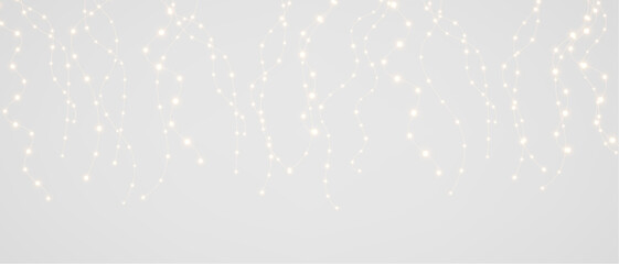 Christmas bulbs twinkle with gentle shine, festive garland string light PNG   © David