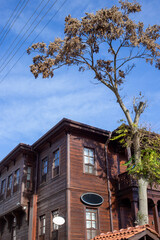 Ottoman wooden house facade under clear blue sky