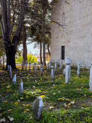 Ottoman gravestones beside historic mosque in Tarakli Sakarya