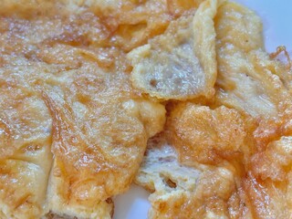 Close-Up Thai Omelette Photo – Crispy Fluffy Fried Egg Thai-Style