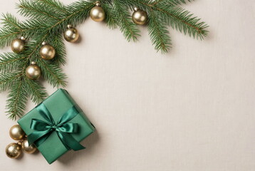 Christmas or New Year fir frame decorations gold colors on beige background with empty copy space for text. holiday and celebration concept for postcard or invitation. top view . Aesthetic minimalist 