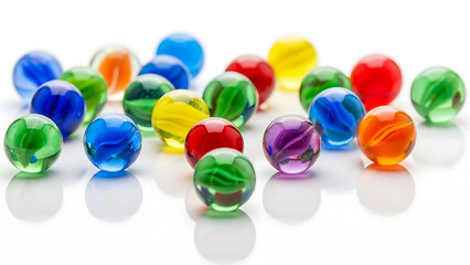 A vibrant assortment of colorful glass marbles scattered playfully on a bright white surface, reflecting light