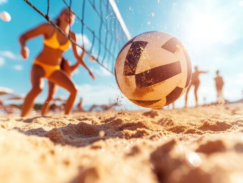 Exciting beach volleyball game takes place under the bright sun and blue sky with players focused on the action
