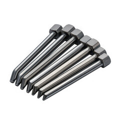 A close up studio shot of a group of shiny metal hex head bolts arranged in a diagonal line on a black background isolated on transparent background