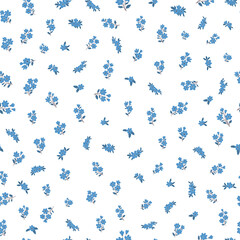 Floral liberty pattern with small colorful flowers field on a white background. Repeating ditsy doodle flower background. Vector design for paper, cover, fabric, interior decor and other