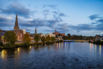 Naklejka premium Inverness city skyline along river ness at dusk