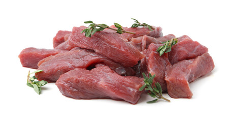 Pieces of raw beef meat and thyme isolated on white