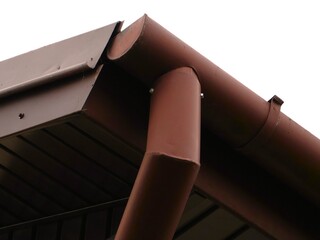 Part of the drainage system, under the roof of the house, on the corner