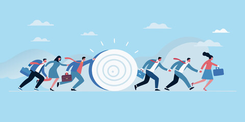 Business team pushing a large target forward towards success