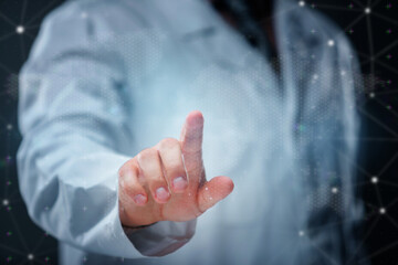 Close-up doctor pointing finger on digital medical background. Concept of healthcare innovation, telemedicine, diagnostics and medical technology.