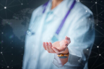 Doctor with stethoscope pointing toward virtual medical space. Concept of healthcare, diagnostics, telemedicine and modern medical technology.