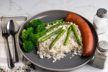  rice  top with asparagus with broccoli and smoked sausage