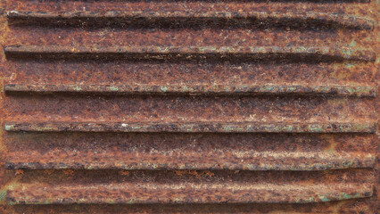 The background of the old iron is rusty red.