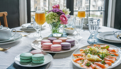Elegant brunch table setting featuring macarons, salmon, and floral arrangement.