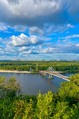 A panoramic view of Podil in Kyiv, Ukraine reveals the historic district&rsquo;s charming streets, riverside scenery, and vibrant urban atmosphere.
