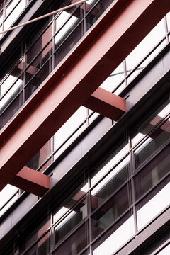 Dynamic modern architecture highlighting facade angles and pattern rhythm as geometry and background tones generate contrast over a refined structure driven by abstract design and urban texture