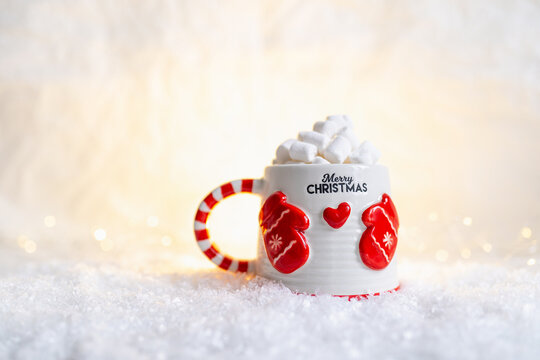 Christmas mug with hot drink and marshmallows