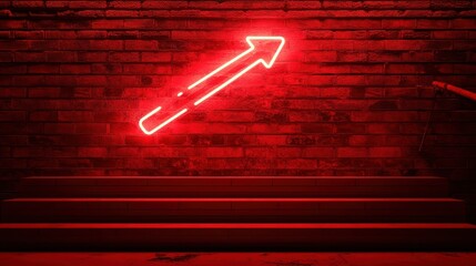 Red neon arrow sign on brick wall steps