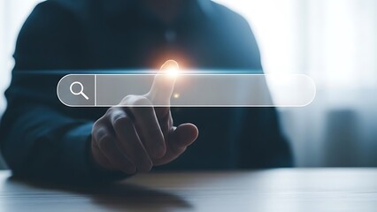 Person s finger touching digital search bar on screen representing online information discovery and internet navigation