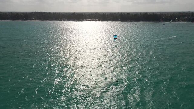 Kitesurfing on tropical paje beach zanzibar, tanzania