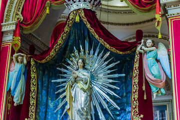 Virgin Mary Statue With Radiant Halo and Angels on Luxurious Church Altar Display