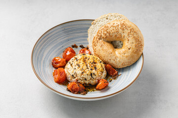 Grilled cheese with roasted cherry tomatoes and bagel
