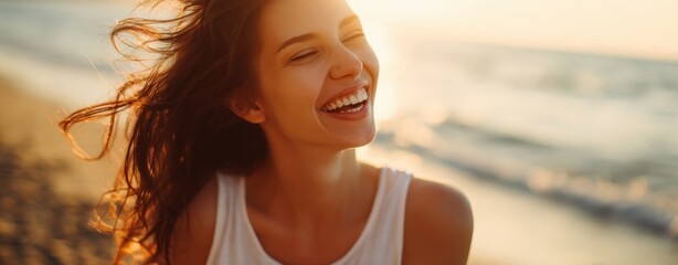 The smiling woman enjoying a sunlit beach breeze during golden hour