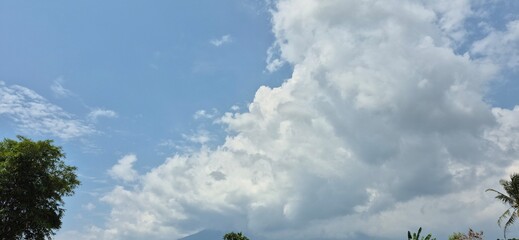 West Java, Indonesia - Desember 2, 2025.
Bright Tropical Morning Sky in Indonesia’s Rainy Season