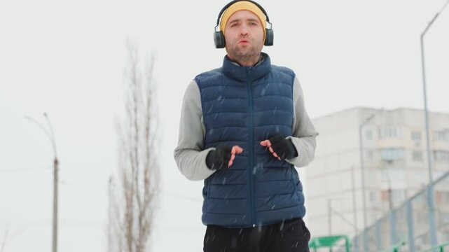 Overworked Young Adult Running in Wintertime