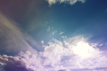 Beautiful sunset sky above clouds with dramatic light. Cabin view from airplane