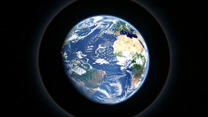 Majestic Earth seen from space with glowing atmospheric halo and distant stars representing