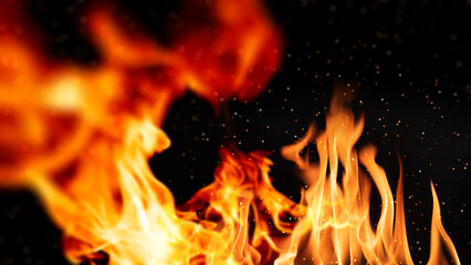 Dramatic red, orange, yellow flame and smoke rising against a dark background. Realistic, abstract...
