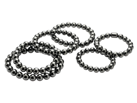 Set of polished magnetic hematite rings and bracelets on a transparent background