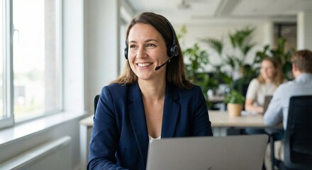 Obraz premium Customer Support Representative Working With Headset in Modern Office
