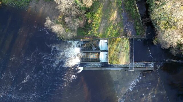 Totnes, Devon, England: DRONE VIEWS: An overhead view of the Weir Hydro: a twin archimedes screw design producing water-powered, clean electricity; it generates 1,250 MWh of electricity per year.