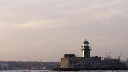 Fototapeta premium Lighthouse seafaring, waterfront sea, Ukraine Mariupol 2 september 2020