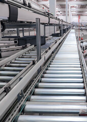 packing line in a logistics warehouse. conveyor belt in a modern production line