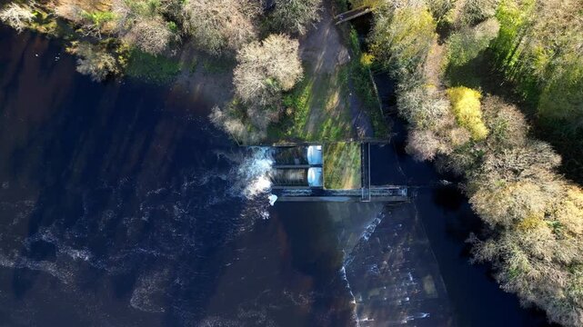 Totnes, Devon, England: DRONE VIEWS: An overhead view of the Weir Hydro: a twin archimedes screw design producing water-powered, clean electricity; it generates 1,250 MWh of electricity per year.