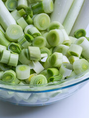 Freshly Chopped Leeks in a Glass Bowl