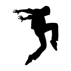 Silhouette of a person in mid air with arms outstretched and one leg bent