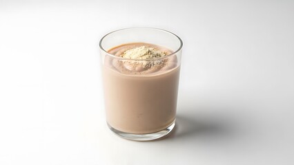 Chocolate smoothie in a clear glass with powder topping on a white background drink beverage