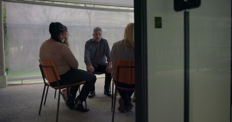 Emotional testimony shared by man in support group, heartfelt confession delivered with expressive...