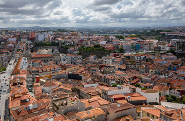 Fototapeta premium Aerial view from tower of Clerigos Church in Porto city, Portugal with Sao Bento railway station in the middle