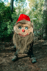 a tall Tio de Nadal with a long straw beard