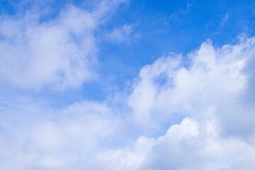 Clouds and sky on a clear day during the day,Blue sky background and white clouds soft focus, and copy space