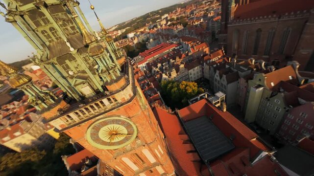 Unusual FPV aerial shot of Gdansk Long Market with Main Town Hall. Poland