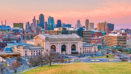 Kansas city skyline at sunset with union station prominently featured