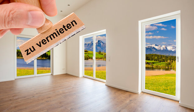 Ein Holzstmpel ist beschriftet mit zu vermieten als Symbolbild f&uuml;r Wohnungsbau und Wohnungspolitik - FOTOMONTAGE