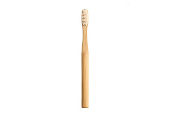 Obraz premium Natural bamboo toothbrush with bristles, vertical orientation, isolated on a transparent background